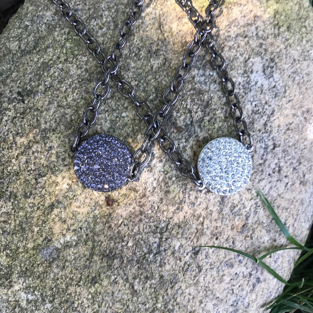 Crystal disc necklace with gunmetal chain.
